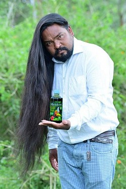 Hoova Herbal Onion hair oil for split ends and control frizzy hair